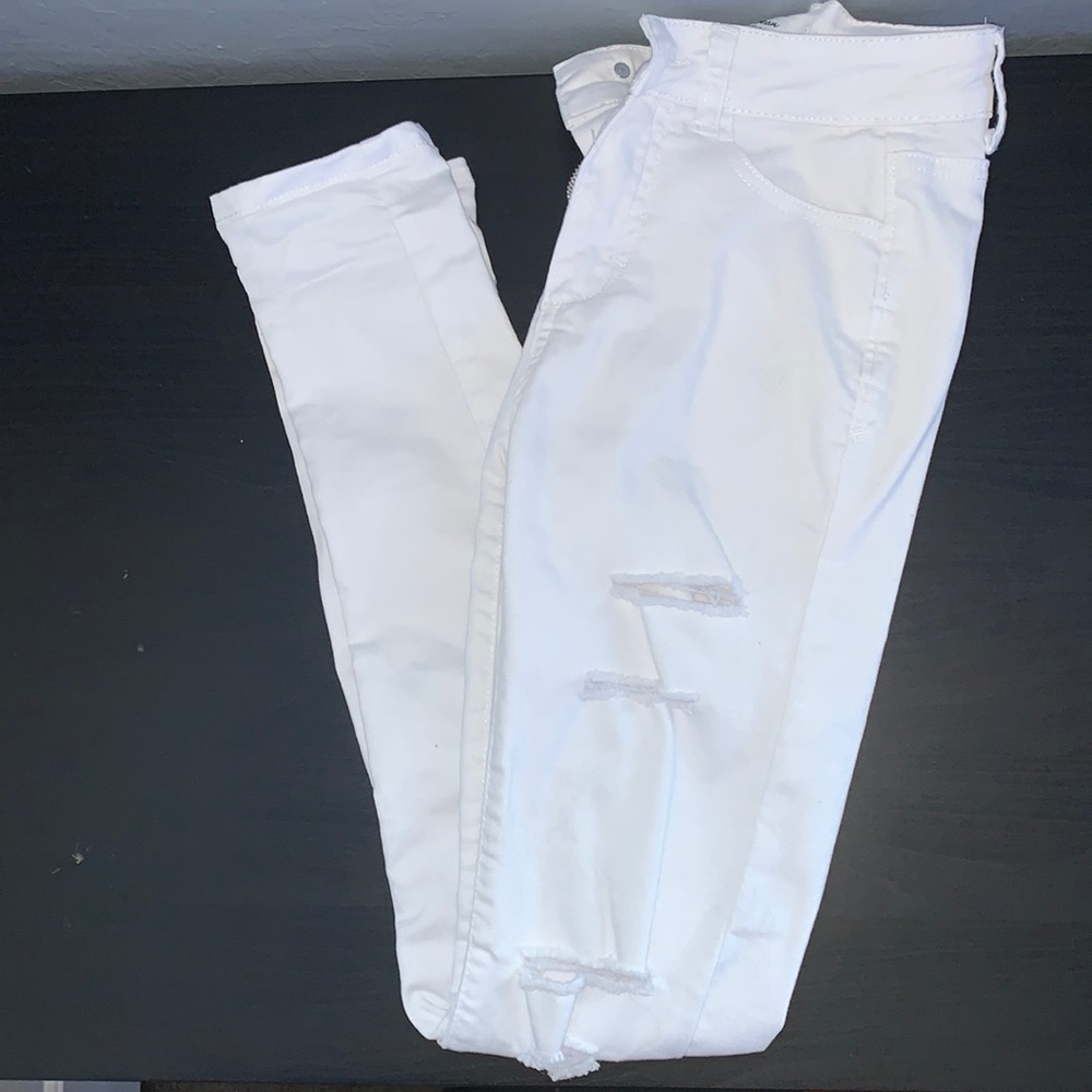 High waisted white ripped skinny jeans